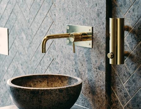 Lundhs Antique® basin and tile wall – photo courtesy of  Morten Rakke for Lundhs