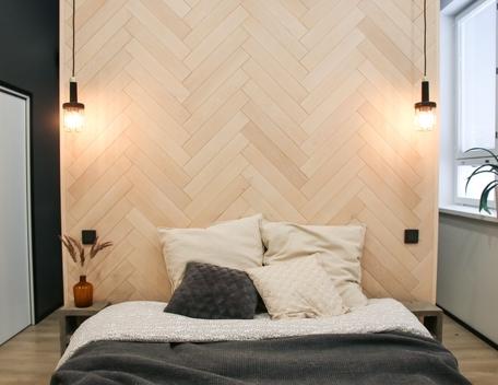 Siparila Pala™ panels in translucent birch used for bedroom accent wall